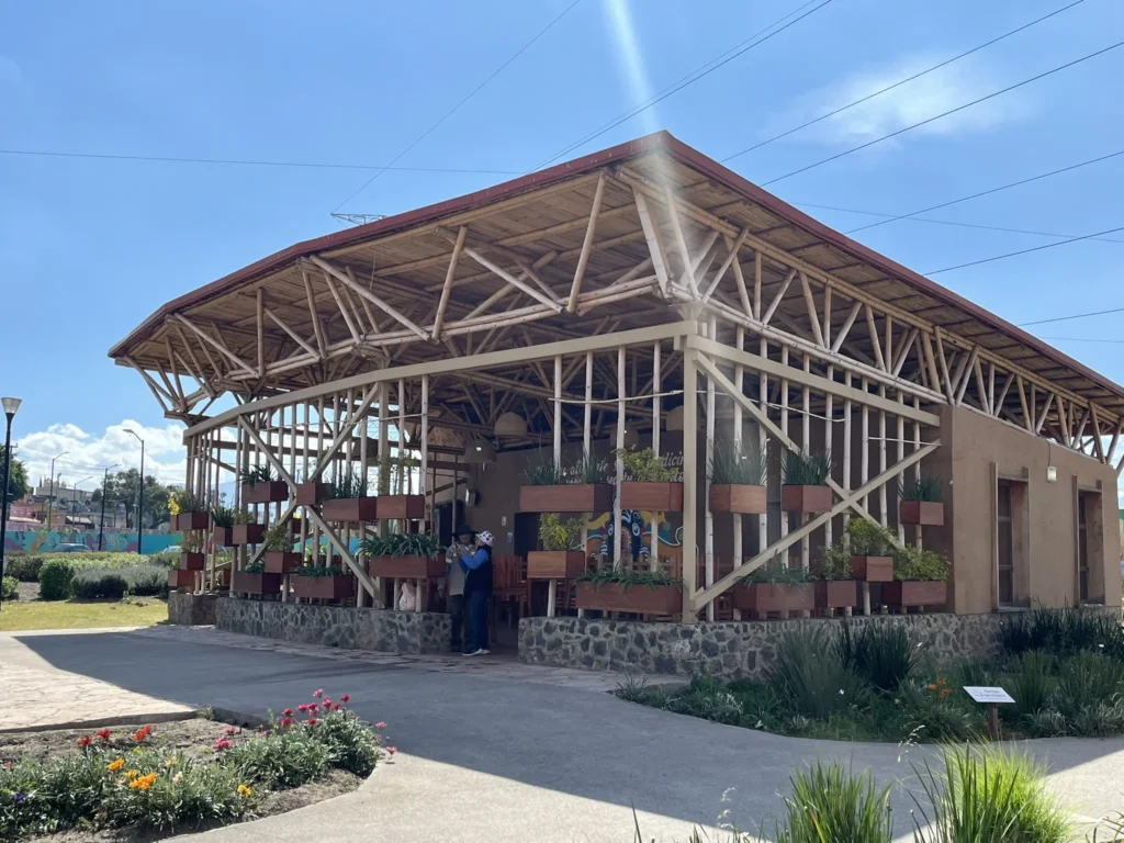 On the other side of the prison wall, UTOPIA La Libertad offers a host of services, including this community cafeteria flanked by milpas and agroecological gardens. Photo courtesy of author.